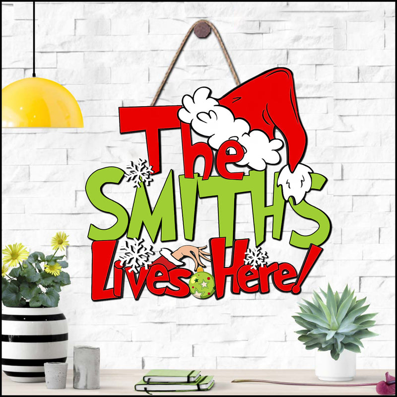The Family Lives Here Christmas Personalized Wooden Door Hanger